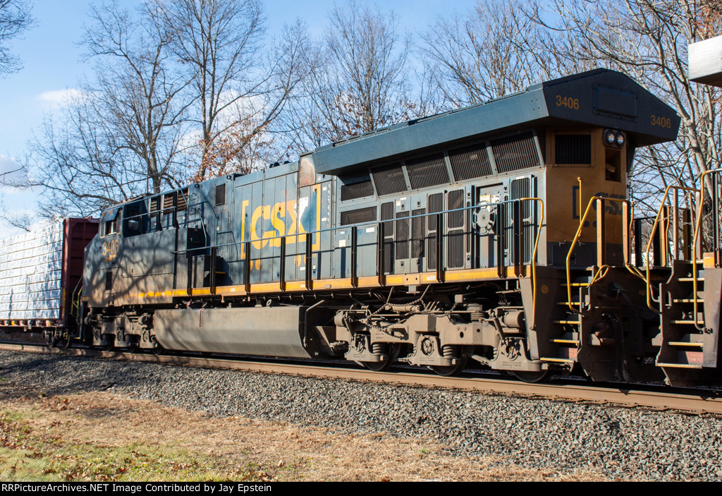 CSX 3406 trails on M436